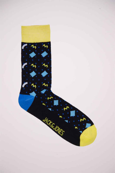 Chaussettes noires d'ACCESSORIES BY JACK & JONES avec un bord jaune, une semelle bleue et divers motifs.