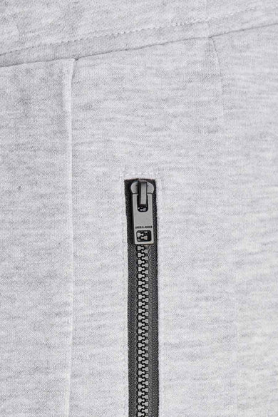 Jean de jogging gris de JACK & JONES JEANS INTELLIGENCE, avec une ceinture élastique et des poches.