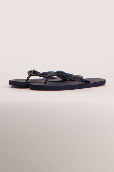 Chaussons gris d'ACCESSORIES BY JACK & JONES, en couleur unie avec le logo de la marque sur la semelle.