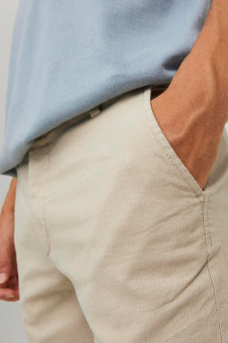 Chino beige de JACK & JONES JEANS INTELLIGENCE, avec motif subtil et poche à main.