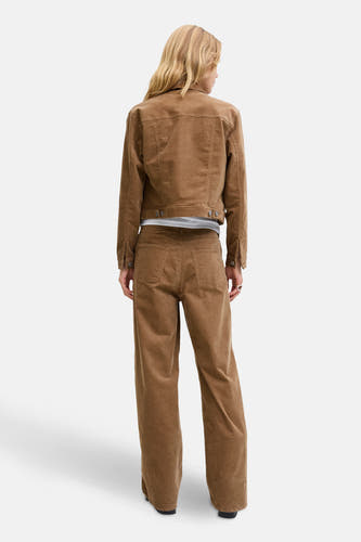 Pantalon beige de JJXX, avec des jambes larges et des poches arrière, vu de derrière.