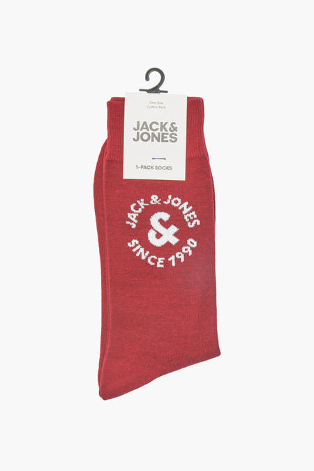 Chaussettes rouges d'ACCESSORIES BY JACK & JONES, avec un logo et l'année 1990 en blanc.
