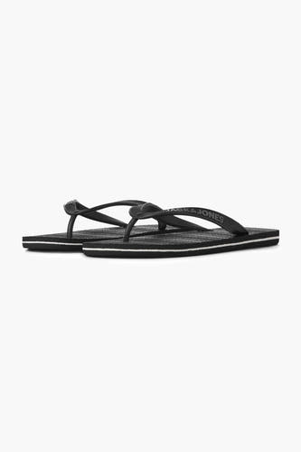 Chaussons gris d'ACCESSORIES BY JACK & JONES, avec une fine ligne blanche sur le bord de la semelle.