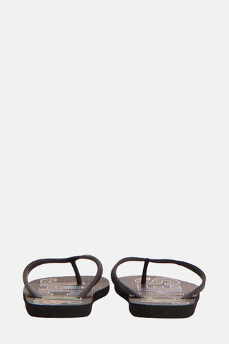 Chaussons noirs d'ACCESSORIES BY JACK & JONES, avec un motif graphique, en gros plan.