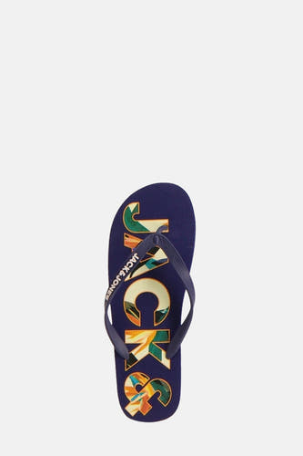 Chaussons bleus d'ACCESSORIES BY JACK & JONES, avec une impression tropicale dans les lettres du logo.