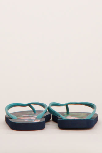 Blauwe slippers van ACCESSORIES BY JACK & JONES, met een opvallend patroon en turquoise bandjes.