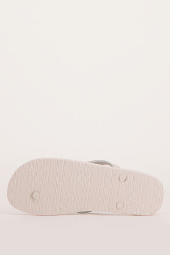 Chaussons multicolores d'ACCESSORIES BY JACK & JONES, avec un motif du nom de la marque sur la semelle.