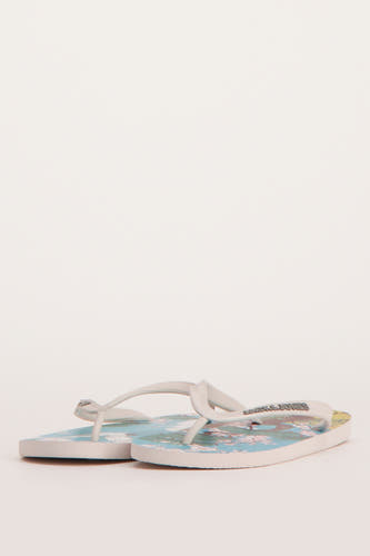 Chaussons multicolores d'ACCESSORIES BY JACK & JONES, avec une impression de fleurs sur la semelle.