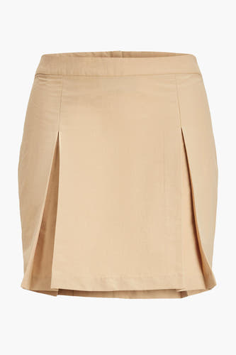 Jupe courte beige JJXX avec des plis à l'avant.