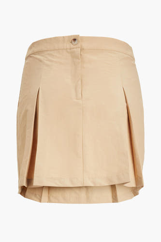 Jupe courte beige de JJXX, avec des plis et une fermeture à glissière à l'avant.