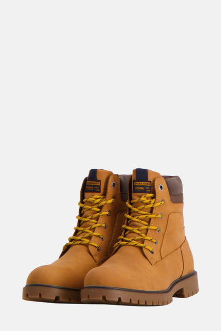 Bottines de ACCESSORIES BY JACK & JONES, avec des lacets jaunes et un col marron.