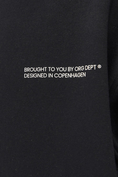 Pull à col rond noir de CORE BY JACK & JONES avec texte brodé blanc sur la poitrine, détail en gros plan