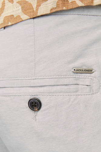 Short beige de JACK & JONES JEANS INTELLIGENCE avec une fermeture à gliss sur sur la poche arrière et un cordon imprimé.
