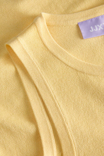 Haut jaune sans manches de JJXX, avec une texture en maille fine et un col rond.
