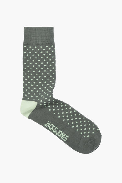Chaussettes vertes d'ACCESSORIES BY JACK & JONES avec des taches blanches et un talon contrastant.