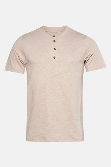 T-shirt beige à manches courtes de PREMIUM BLUE par JACK & JONES, avec col boutonné et une fine texture.