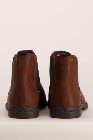 Bottes brunes d'Accessories by Jack & Jones, vues de derrière avec des inserts élastiques sur les côtés.