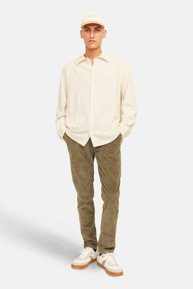 Pantalon brun de JACK & JONES JEANS INTELLIGENCE, avec une texture corduroy et une coupe décontractée.