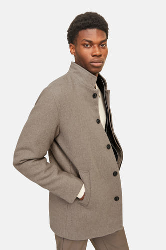 Manteau long beige de PREMIUM par JACK & JONES, avec fermeture à boutons et poches.