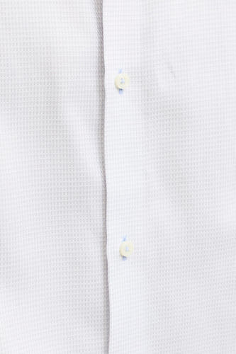 Chemise blanche à manches longues de PREMIUM by JACK & JONES, avec un motif gaufré fin et des boutons.