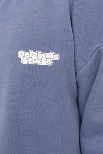 Blauw sweatshirt met witte "Originals Studio" tekst.