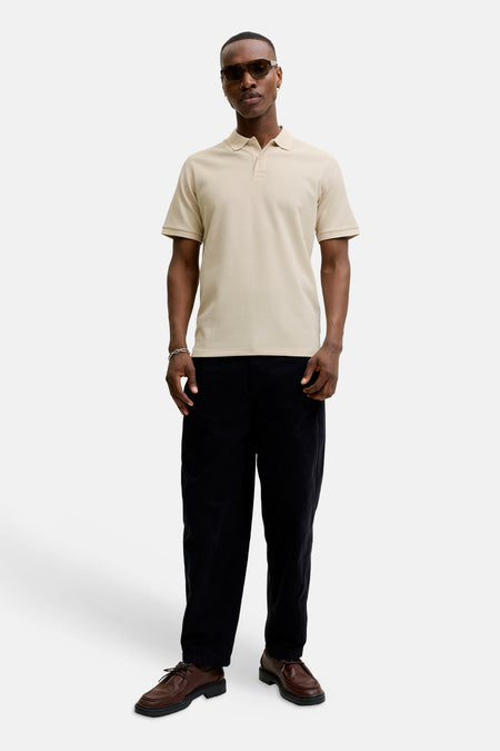 Beige polo met korte mouwen van CORE BY JACK & JONES, met fijn gestructureerde stof.