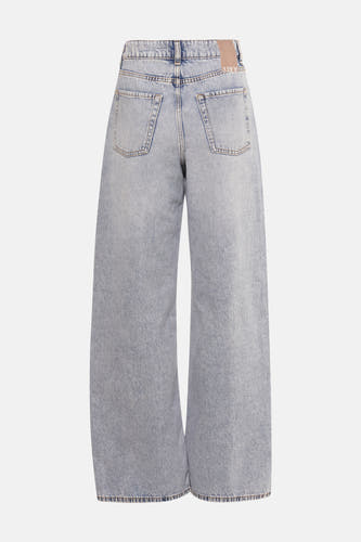 Jean bleu clair large de JJXX, avec des poches arrière et une étiquette de marque à l'arrière.