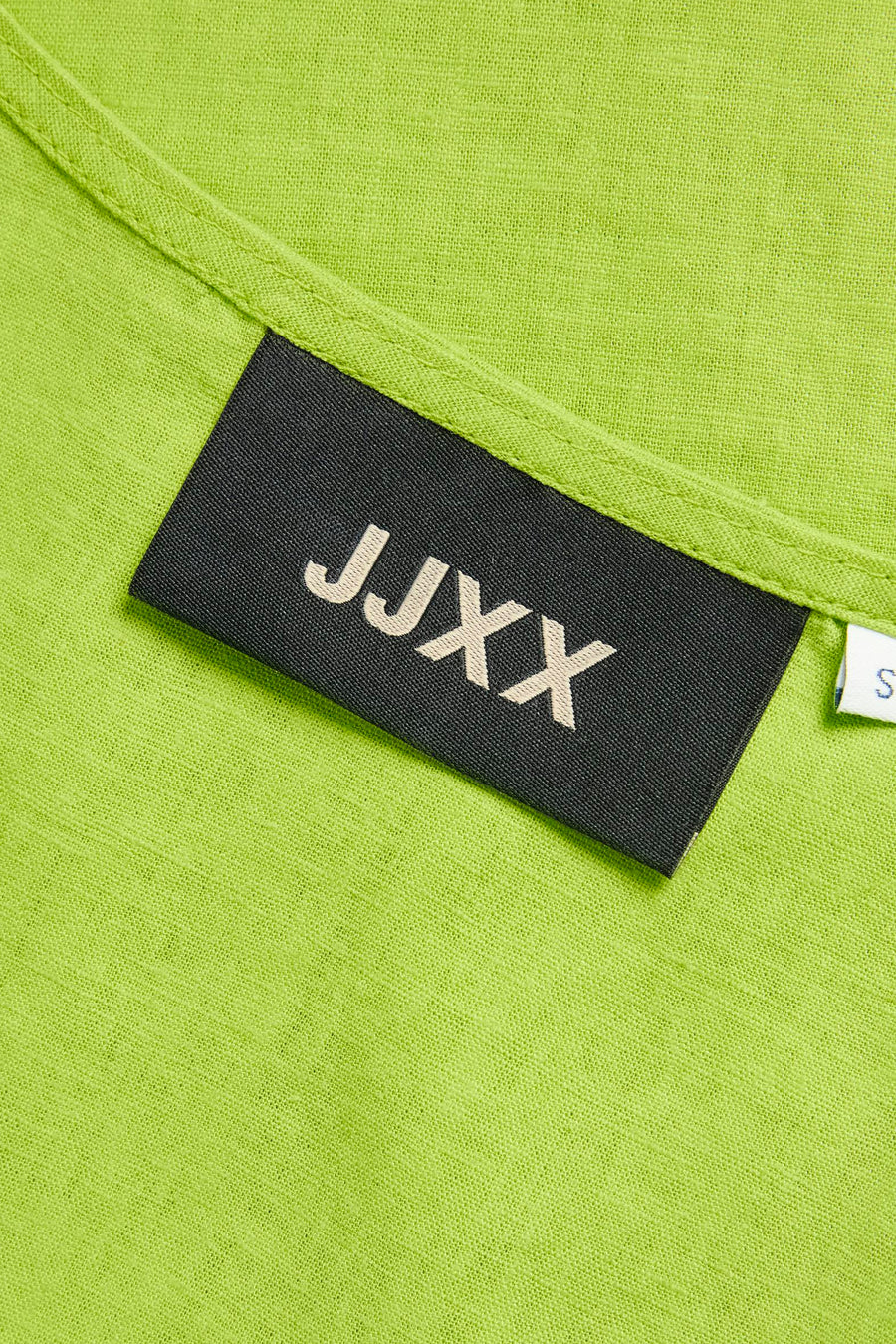 Groene linnen top met zwart JJXX-label en maat 'S'.