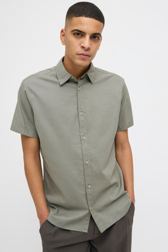Chemise kaki à manches courtes de PREMIUM BLUE par JACK & JONES, avec col boutonné et design simple.