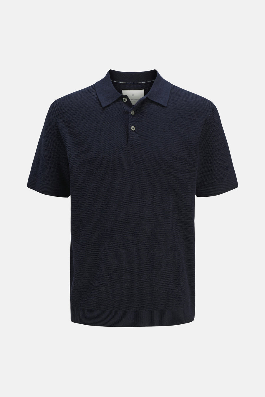 Polo bleu à manches courtes de PREMIUM by JACK & JONES, avec une texture finement tissée et un col boutonné.