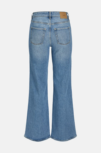 Jean flare bleu moyen de JJXX, avec des poches arrière et une étiquette en cuir.