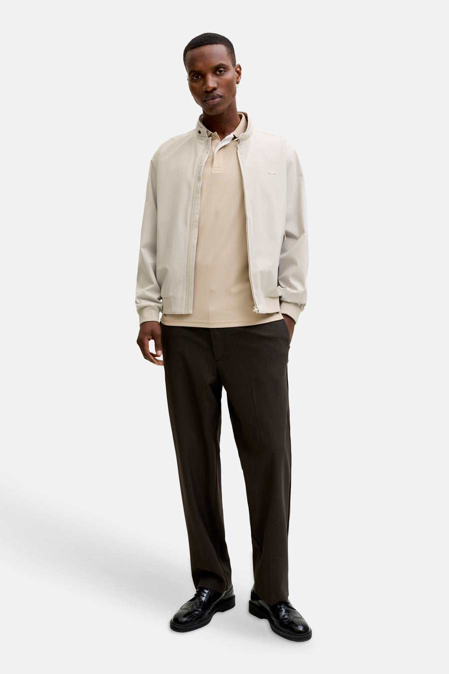 Veste courte beige de PREMIUM by JACK & JONES avec fermeture éclair, petit logo métallique, ourlet et poignets côtelés.