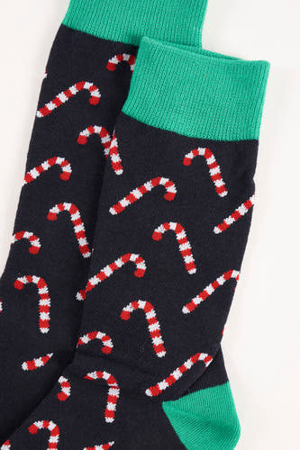 Zwarte sokken van ACCESSORIES BY JACK & JONES, met een kerstthema en een patroon van zuurstokken.
