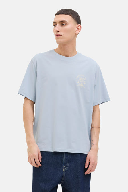 T-shirt bleu à manches courtes d'ORIGINALS BY JACK & JONES, avec une impression graphique sur la poitrine.