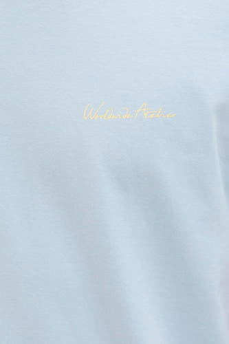 T-shirt bleu à manches courtes d'ORIGINALS par JACK & JONES, avec une légère impression de texte.