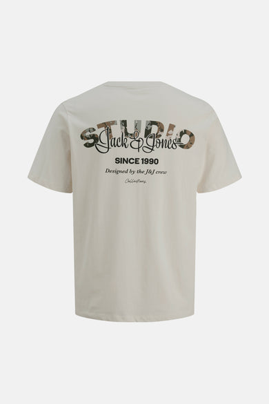 T-shirt beige à manches courtes de CORE par JACK & JONES, avec imprimé 'Studio Jack & Jones' sur le dos.