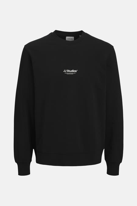 Gilet noir avec col rond de CORE par JACK & JONES, avec une petite impression de texte blanc sur la poitrine.