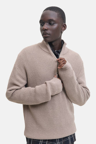 Sweat-shirt beige de PREMIUM par JACK & JONES, avec fermeture éclair et longues manches sur un chemisier à carreaux.