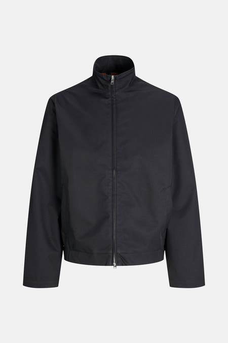 Manteau noir court JJREBEL avec fermeture éclair et col montant.