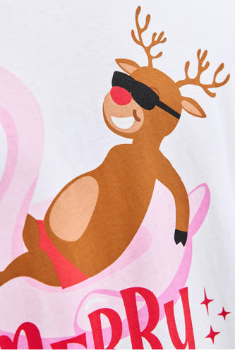 T-shirt blanc à manches courtes d'ORIGINALS BY JACK & JONES, avec une impression d'un renne sur un flotteur rose.