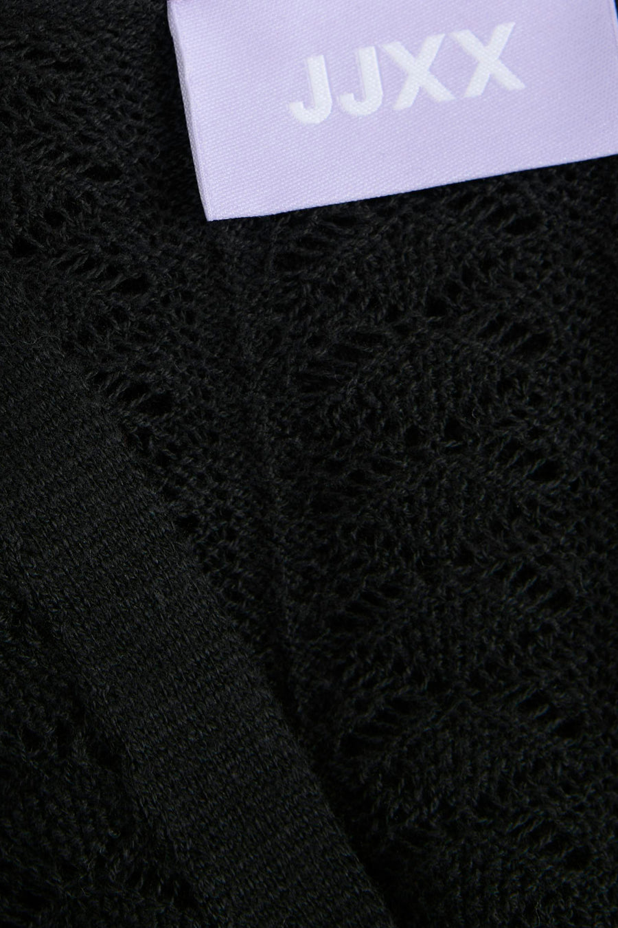 Sweat-shirt noir JJXX, avec une texture ouverte et un étiquette visible.