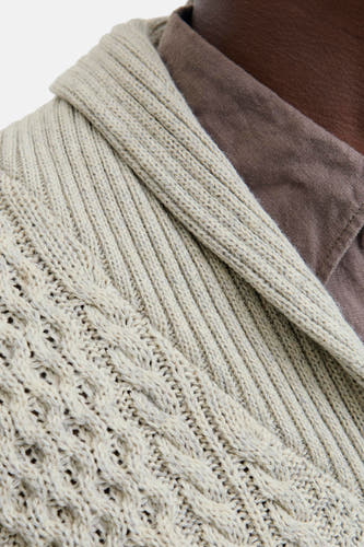 Gilet beige de PREMIUM BLUE par JACK & JONES, avec un motif côtelé et une encolure en tricot rayé.