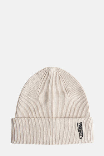 Chapeau beige d'ACCESSORIES BY JACK & JONES, avec un effet côtelé et une étiquette imprimée.