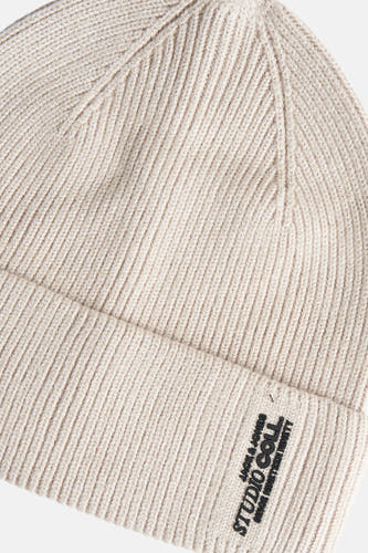 Casquette beige d'ACCESSORIES BY JACK & JONES avec texture côtelée et logo de marque.