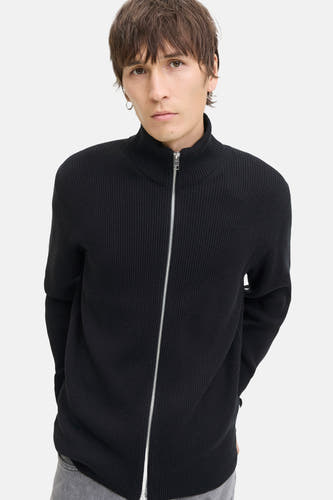 Gilet noir de CORE BY JACK & JONES, avec une fermeture à glissière argentée et un col haut.