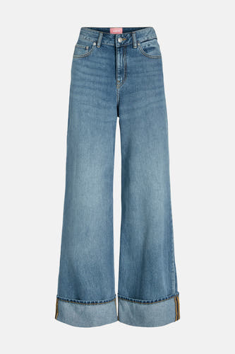 Jean large de denim bleu, de JJXX, avec des poches arrière rabattues.