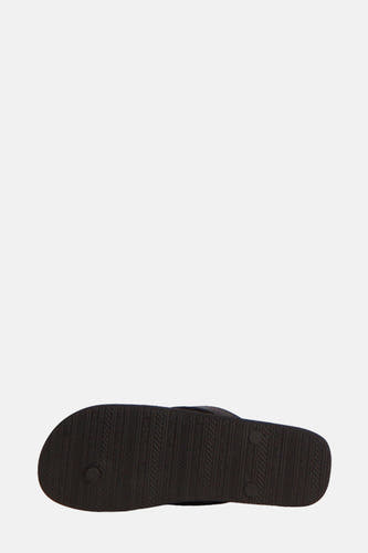 Chaussons noirs d'ACCESSORIES BY JACK & JONES, avec un motif de semelle rayé.