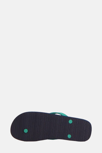 Chaussons bleus d'ACCESSORIES BY JACK & JONES, avec des logos visibles sur la semelle et des accents verts.