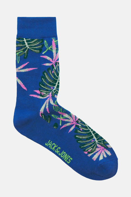 Chaussettes bleues d'ACCESSORIES BY JACK & JONES avec un motif de feuille tropicale en rose et vert.