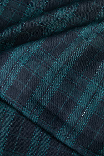 Robe bleue JJXX avec un motif tartan écossais à carreaux et des plis.